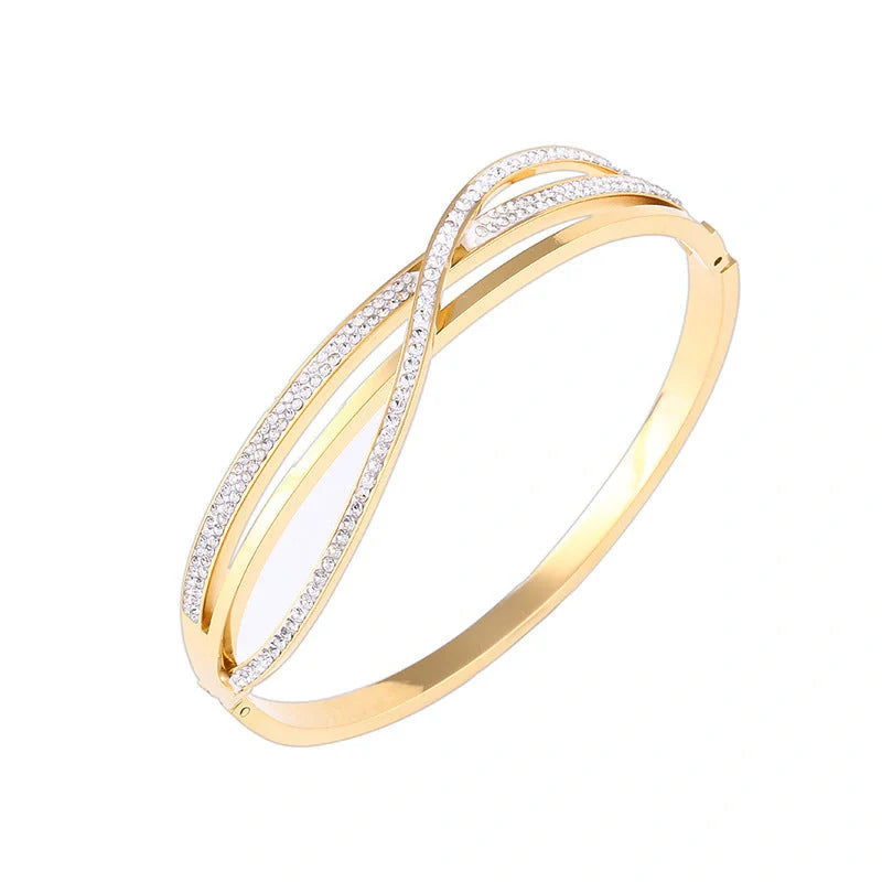 Titanium steel bracelet with geometric diamond detailing, available in rose gold, golden, and silver finishes