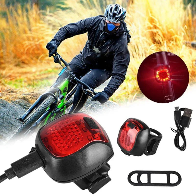 Rechargeable bicycle tail light with 5 adjustable lighting modes, made of durable ABS plastic for scratch and impact resistance.