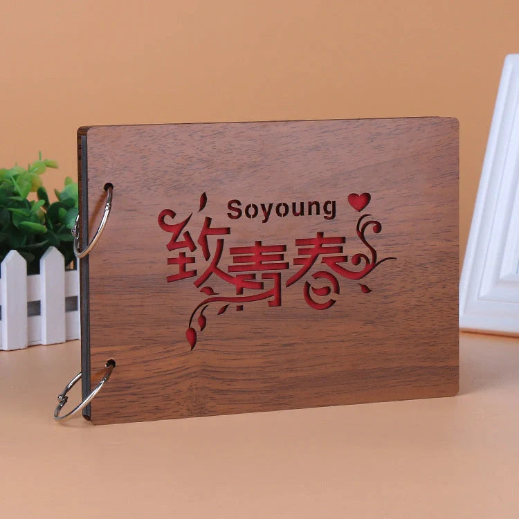 Handmade wooden photo album with custom designs for memory preservation