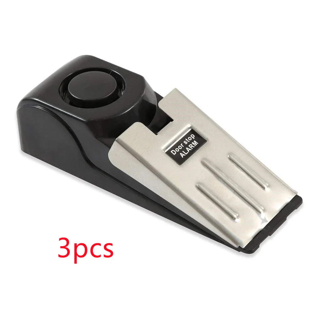 Wedge-shaped home security alarm with ABS construction and loud siren to deter intruders