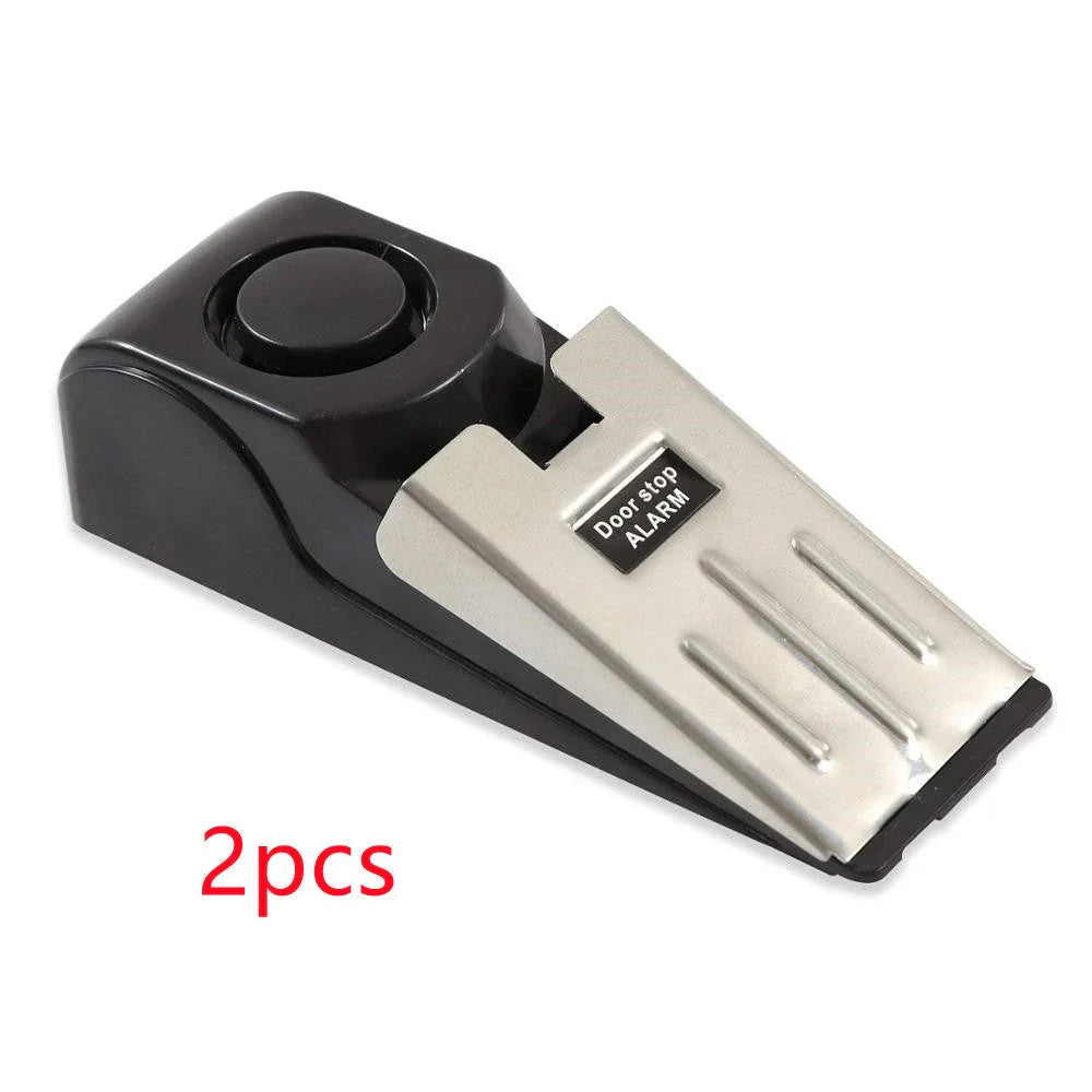 Wedge-shaped home security alarm with ABS construction and loud siren to deter intruders