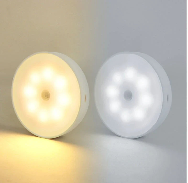 Motion-activated LED puck lights in warm and white color options, with various pack sizes and USB recharging