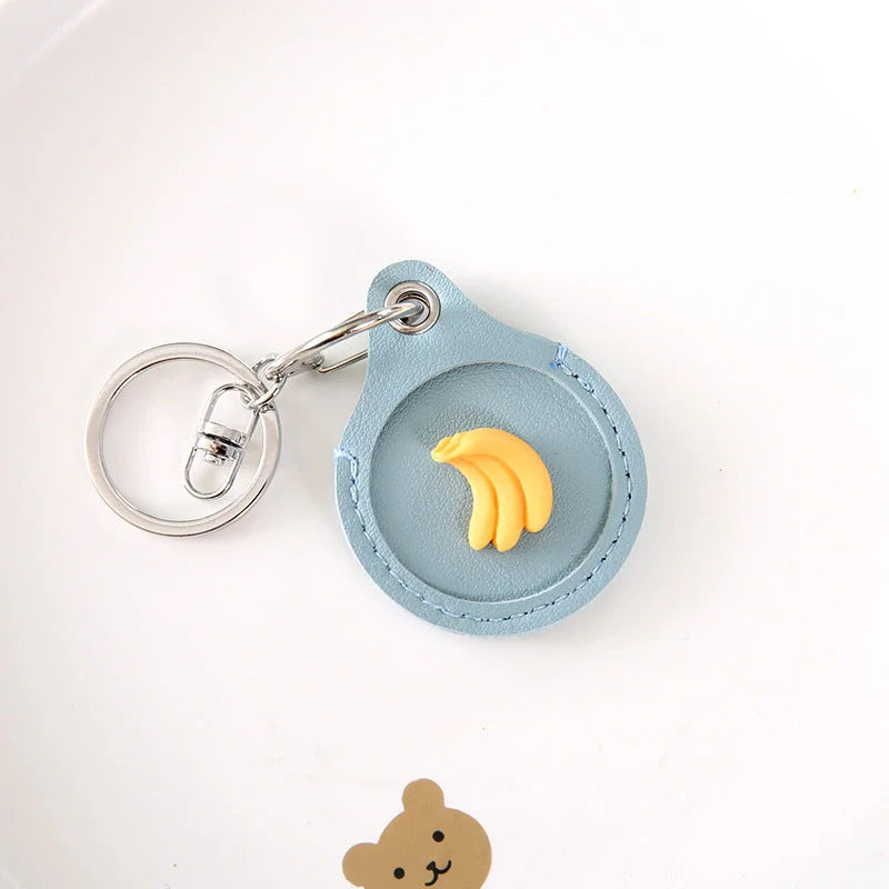 Fruit-themed silicone protective case for Apple AirTag with keychain