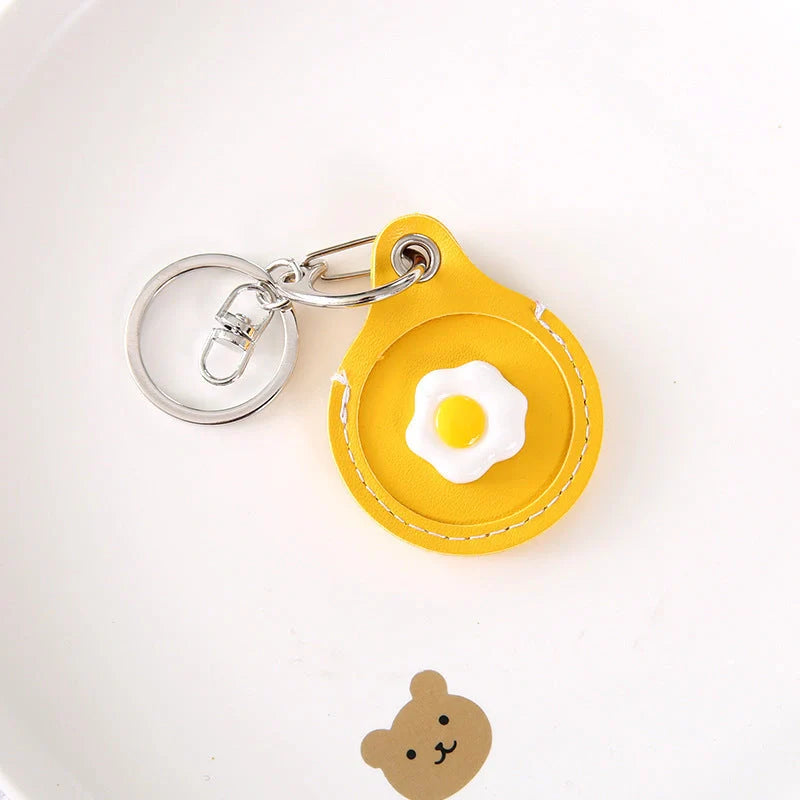 Fruit-themed silicone protective case for Apple AirTag with keychain