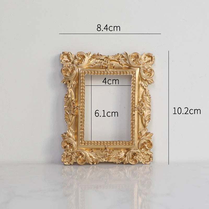 Golden Retro Photo Frame displaying jewellery and art in a Nordic-style resin design