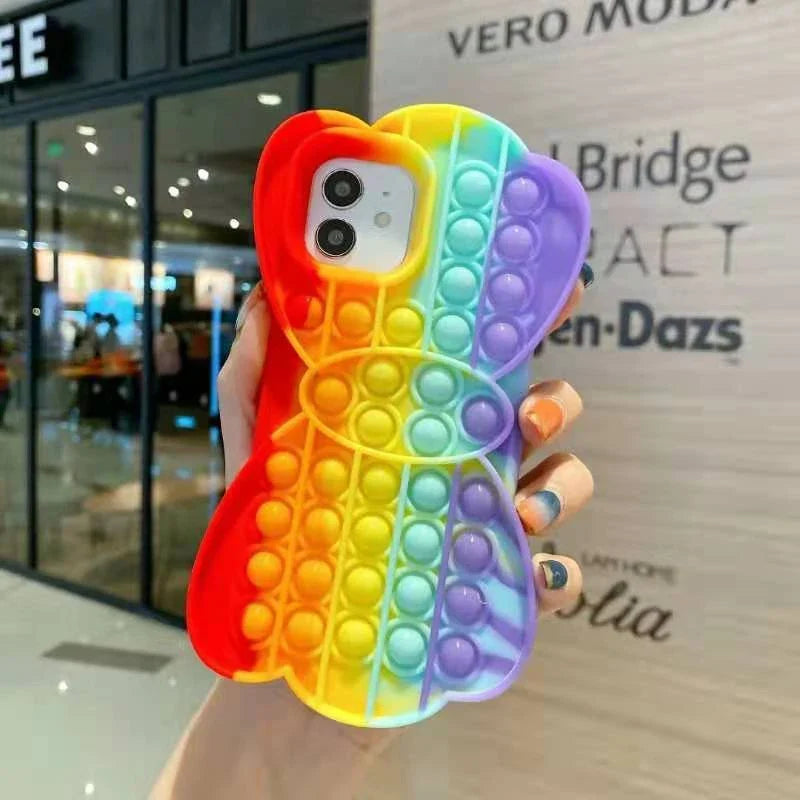 Stress-relieving phone case with colorful bubble fidget feature, suitable for various iPhone models