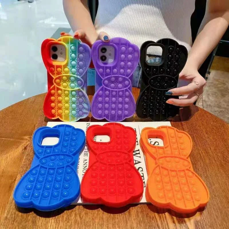 Stress-relieving phone case with colorful bubble fidget feature, suitable for various iPhone models
