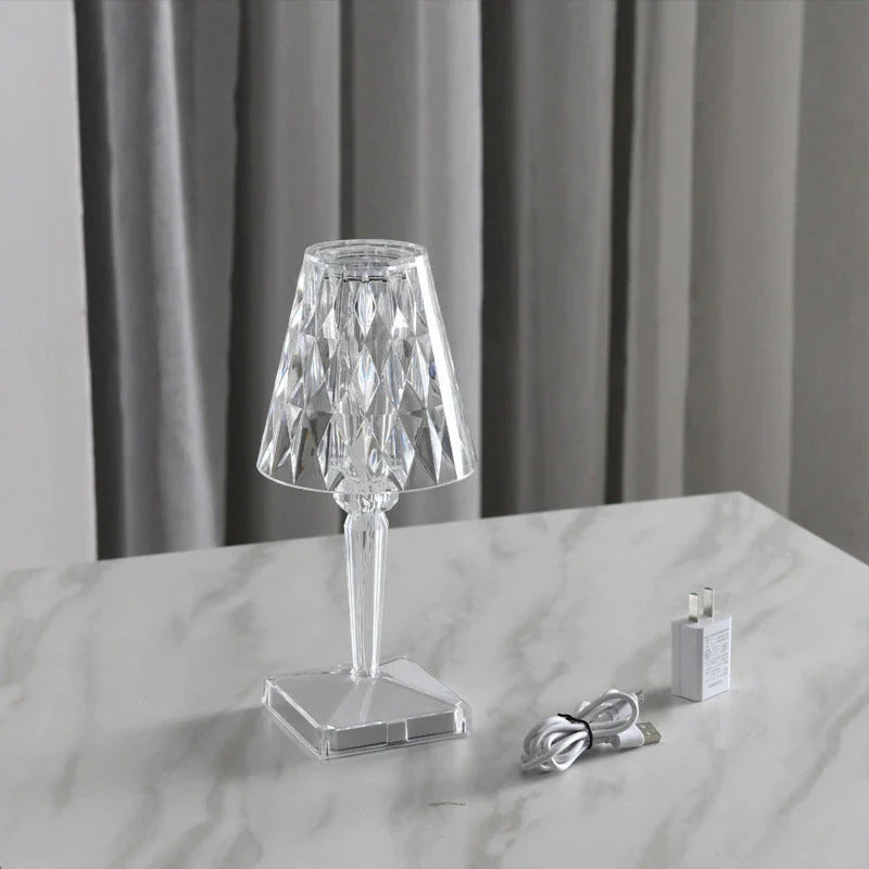 Elegant acrylic desk lamp with mesmerising prismatic lighting effects, perfect for enhancing the ambiance in any room.