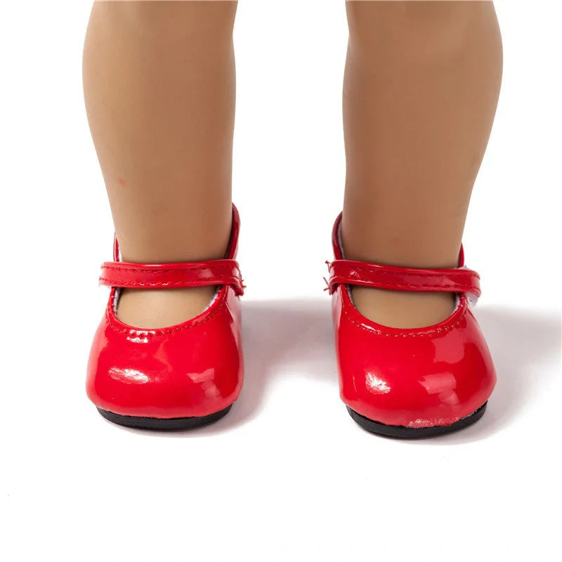 Stylish leather dolls' shoes in various colours, designed to perfectly complement American Girl dolls.