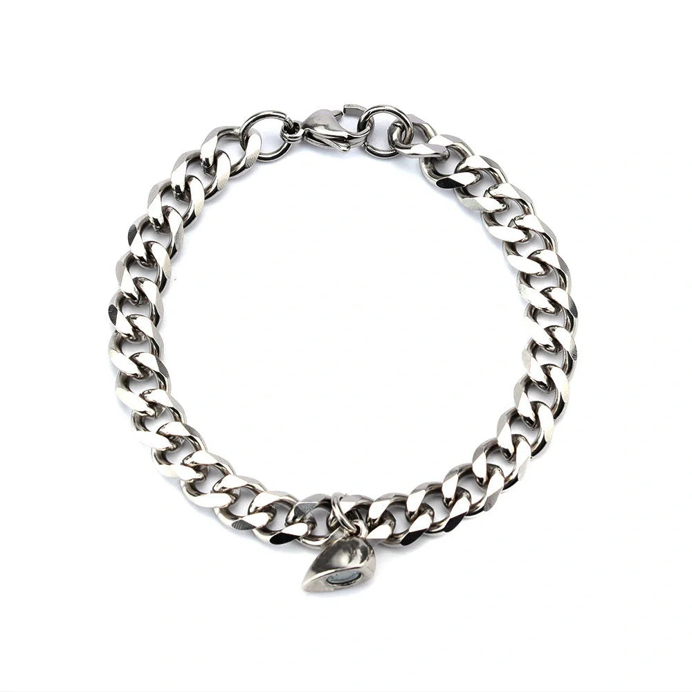 Elegant titanium steel couple bracelets with heart design, perfect for love gifts.