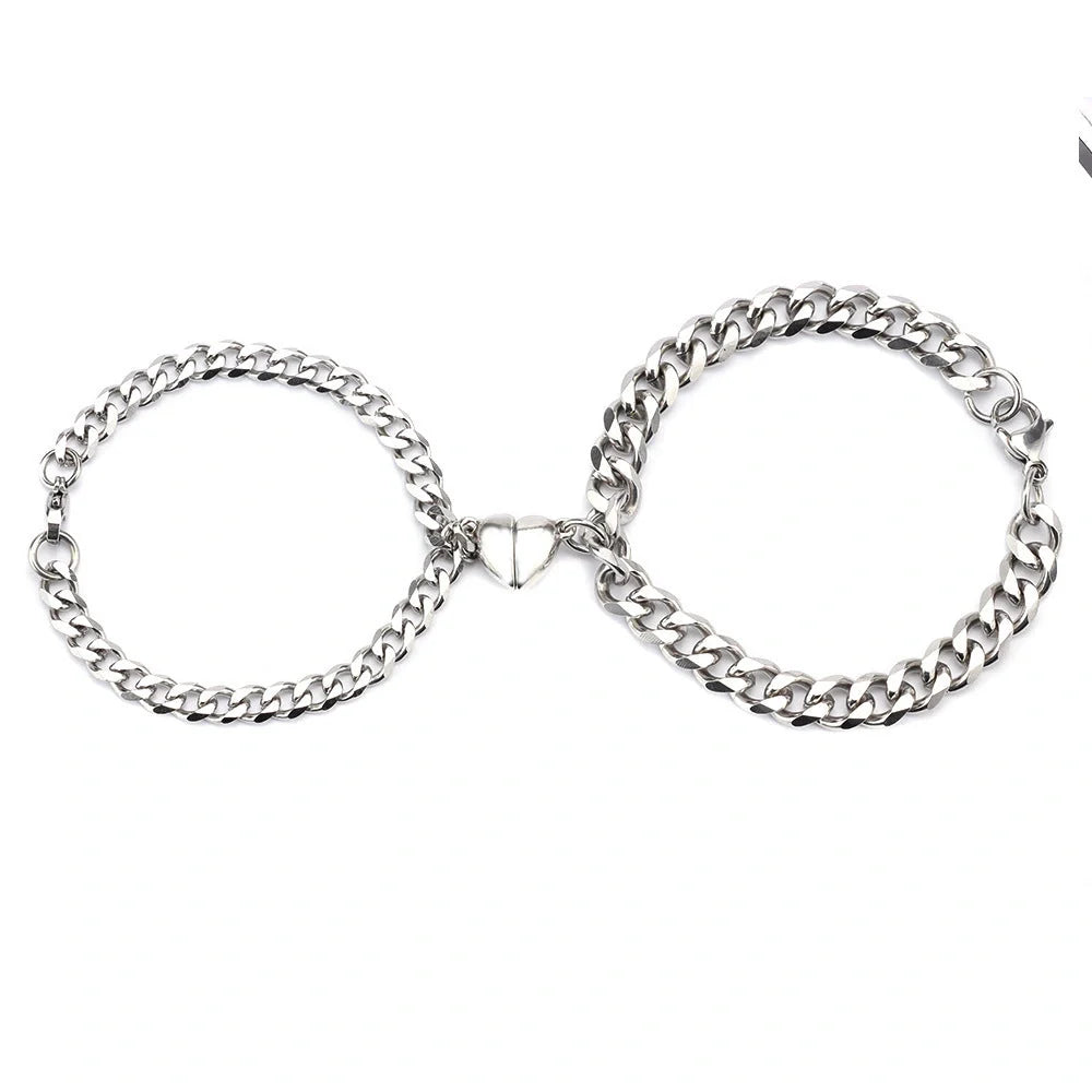 Elegant titanium steel couple bracelets with heart design, perfect for love gifts.