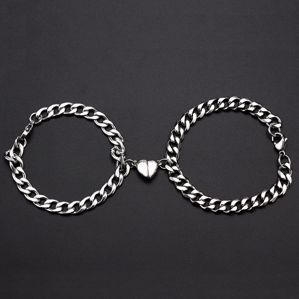 Elegant titanium steel couple bracelets with heart design, perfect for love gifts.