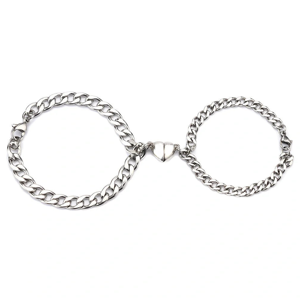 Elegant titanium steel couple bracelets with heart design, perfect for love gifts.
