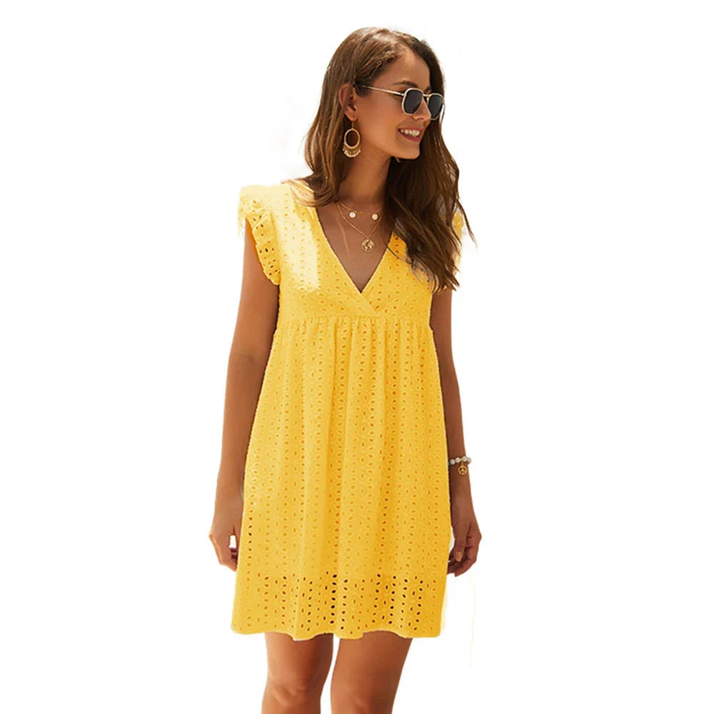 A stylish cotton mini dress with a v-neck and ruffled sleeves, perfect for summer days and nights.