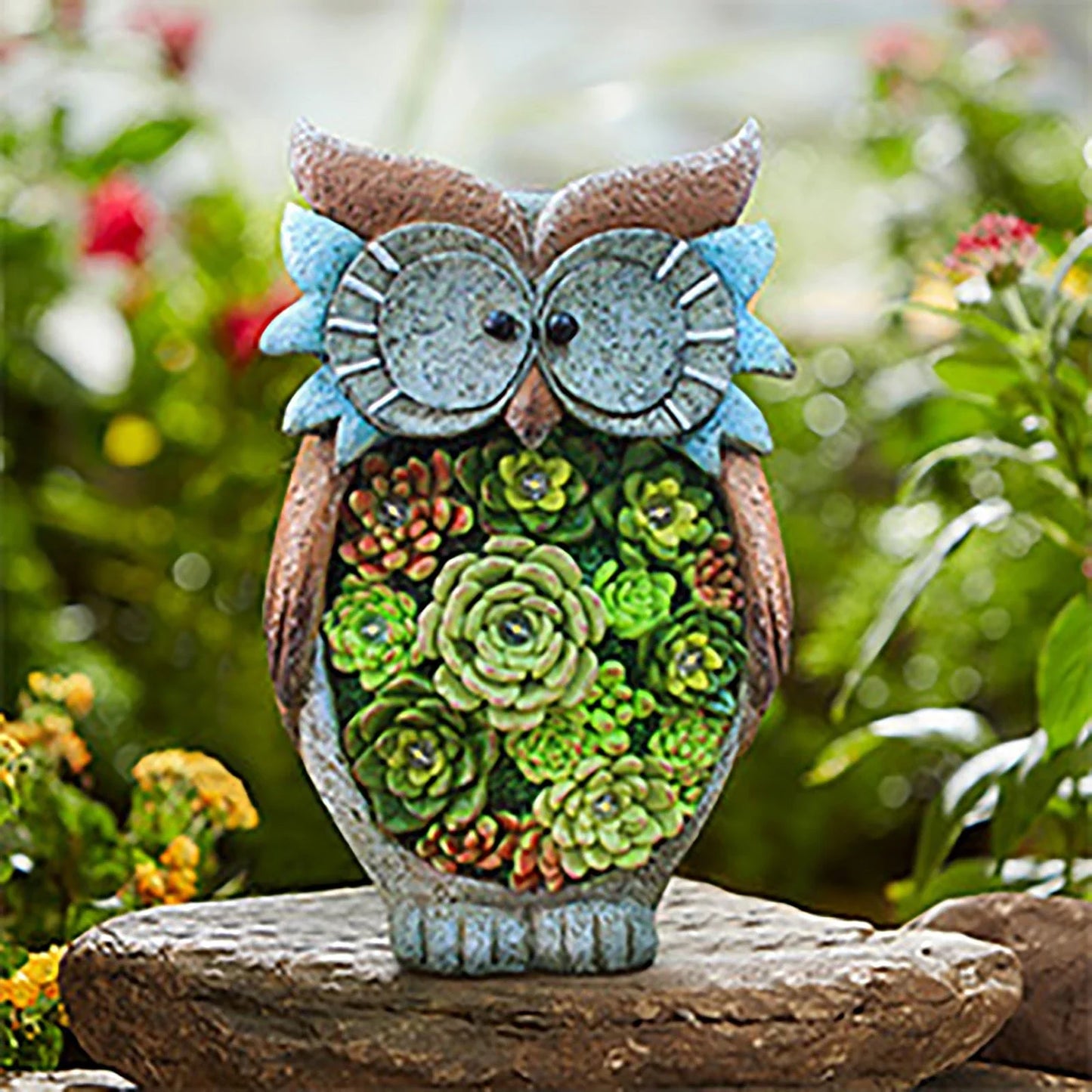 A charming solar-powered outdoor owl light made of high-quality resin, providing warm illumination for your yard or garden