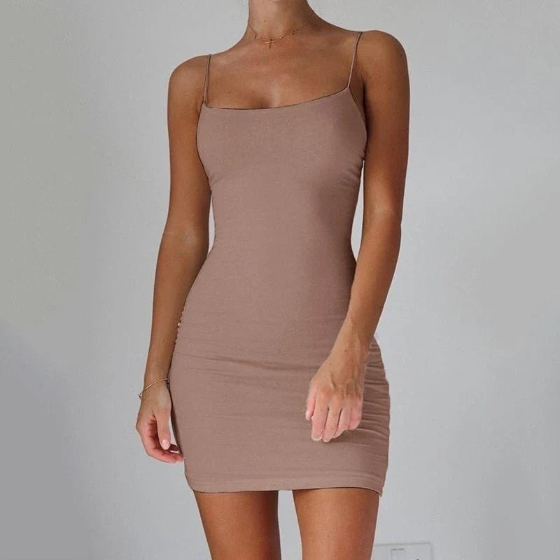 Stylish spaghetti strap mini dress in various colors, perfect for any occasion