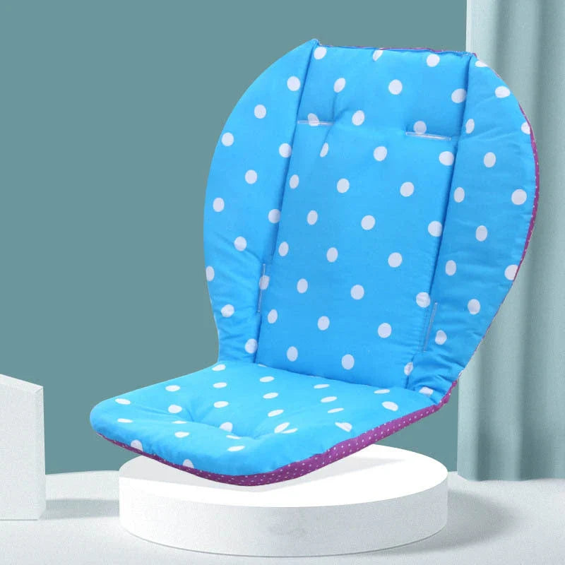 A soft, padded cotton stroller cushion in various colorful, gender-neutral patterns to keep a baby comfortable and supported.