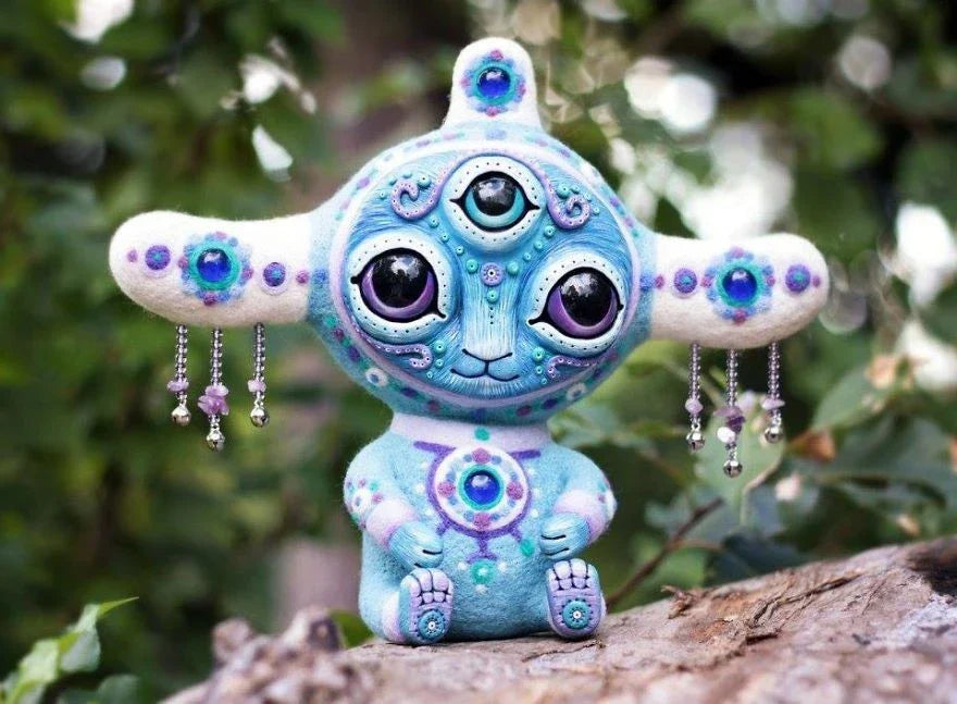 Enchanting handcrafted elf garden statue made of high-quality resin, featuring vivid colors and intricate details that bring a mythical creature to life in your outdoor oasis