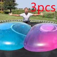 Oversized inflatable bounce balls in various vibrant colors for fun parties and celebrations
