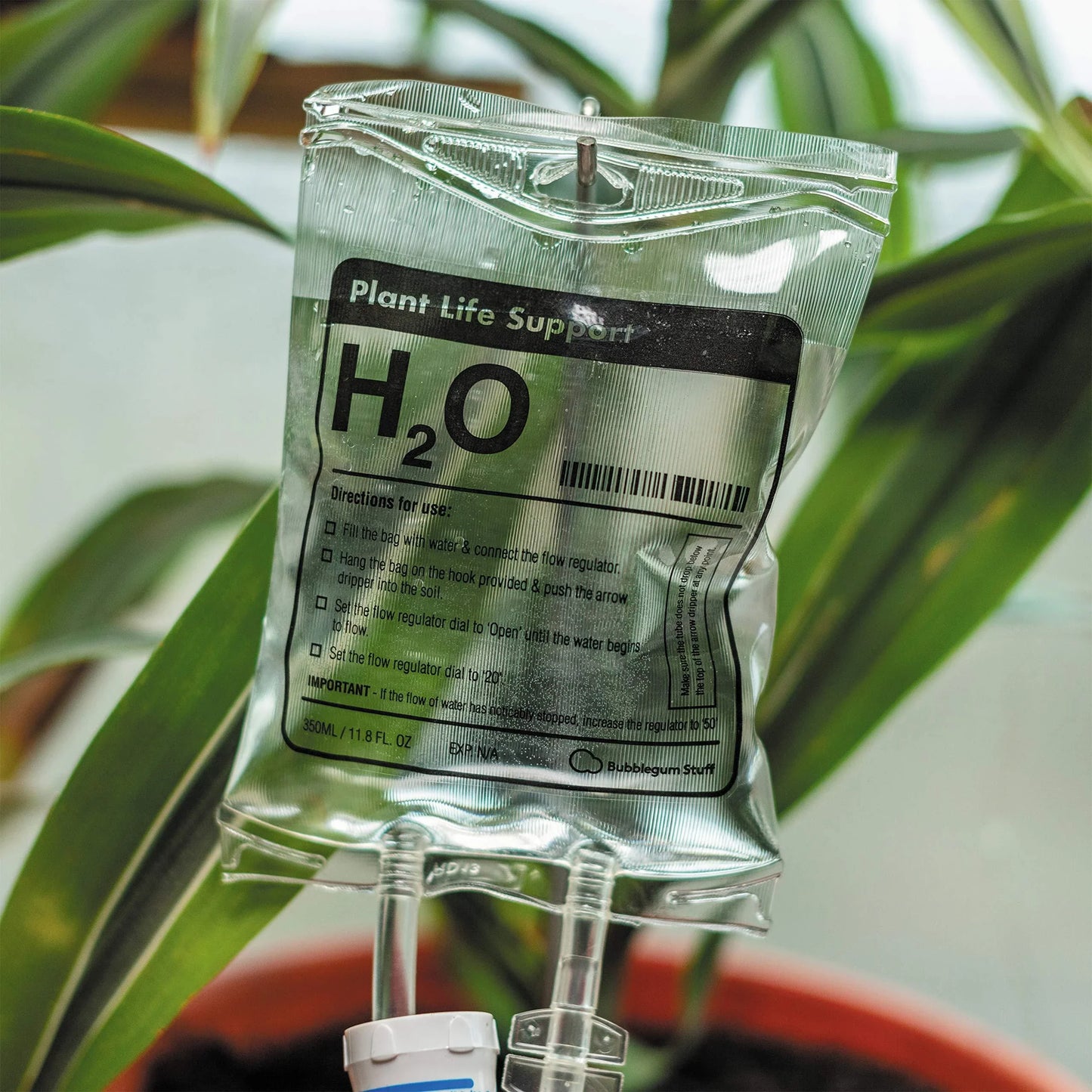 Premium drip-feed plant watering bag in transparent color, designed for indoor gardening and travel