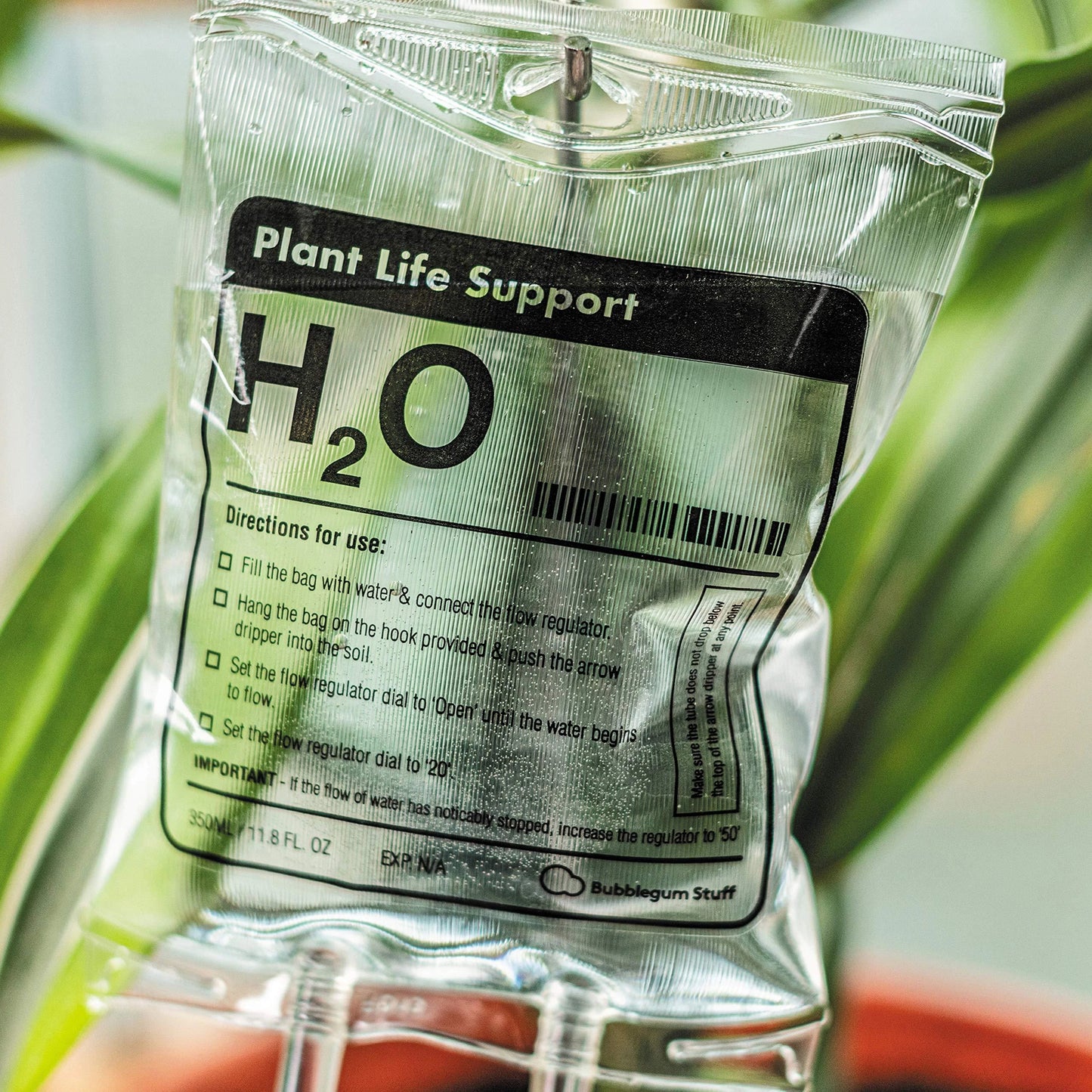 Premium drip-feed plant watering bag in transparent color, designed for indoor gardening and travel