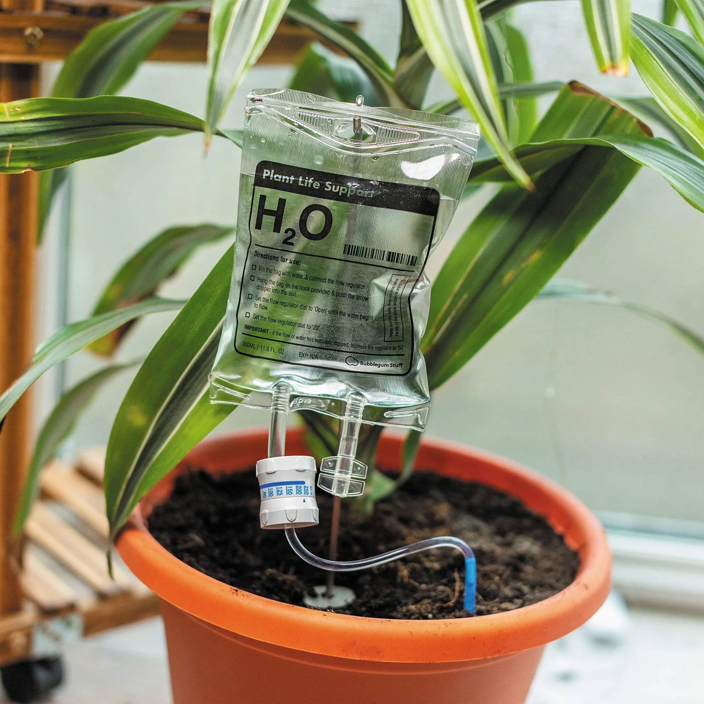 Premium drip-feed plant watering bag in transparent color, designed for indoor gardening and travel