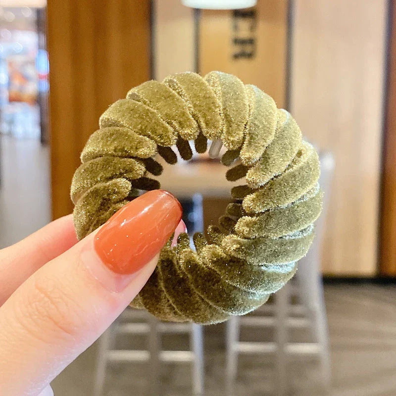 Elegant hair circle accessory with flexible design and teeth for creating stylish ponytails