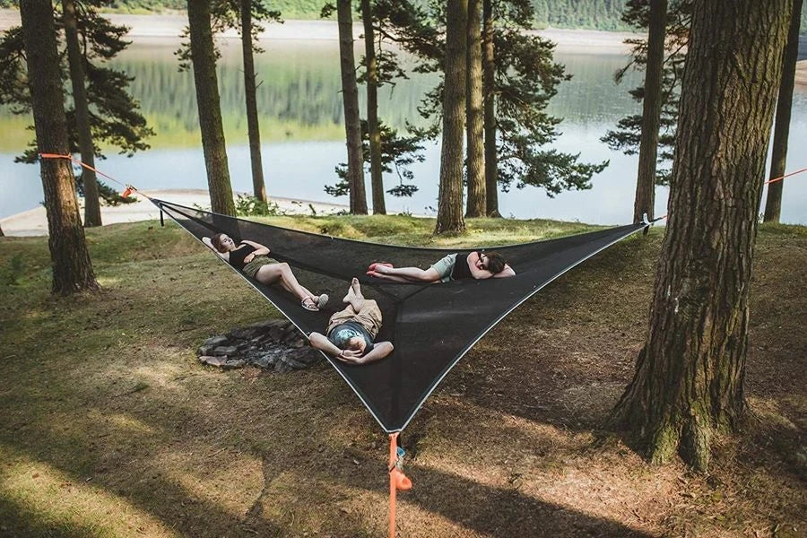 Spacious 3-person outdoor hammock with unique 3-point anchor system for maximum comfort and stability