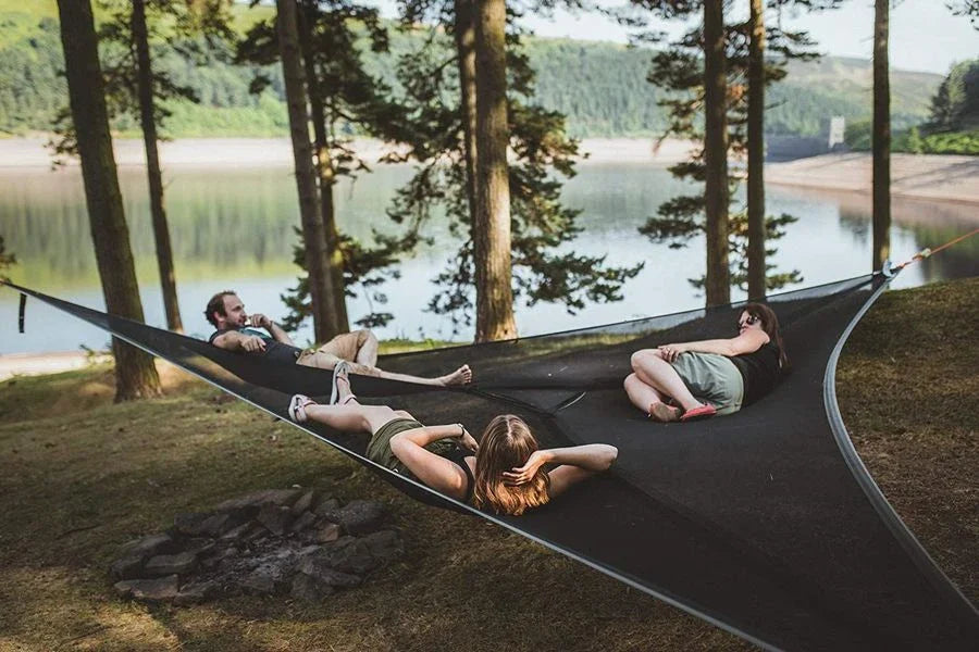 Spacious 3-person outdoor hammock with unique 3-point anchor system for maximum comfort and stability