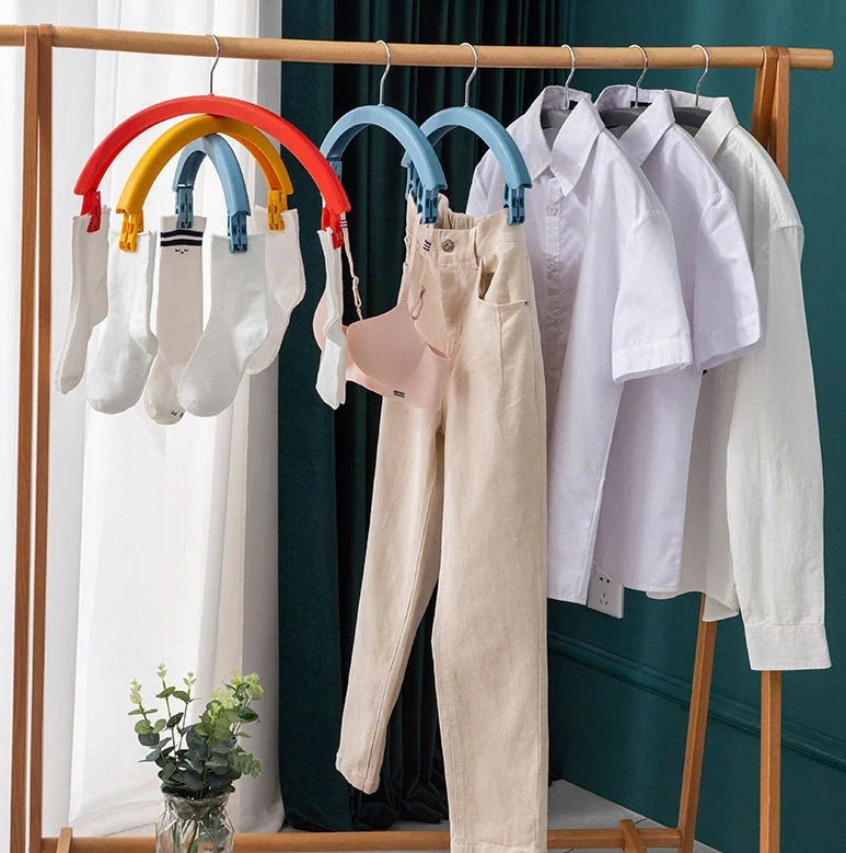 Premium three-tier clothes drying rack with 360-degree rotating design, non-marking construction, and windproof clip for efficient and convenient laundry drying.