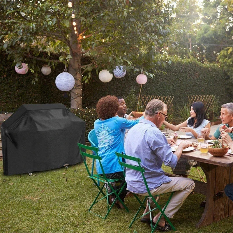 Premium outdoor grill cover made of durable 210D Oxford cloth with a silver coating to protect against weather and elements