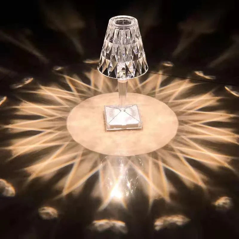 Elegant acrylic desk lamp with mesmerising prismatic lighting effects, perfect for enhancing the ambiance in any room.