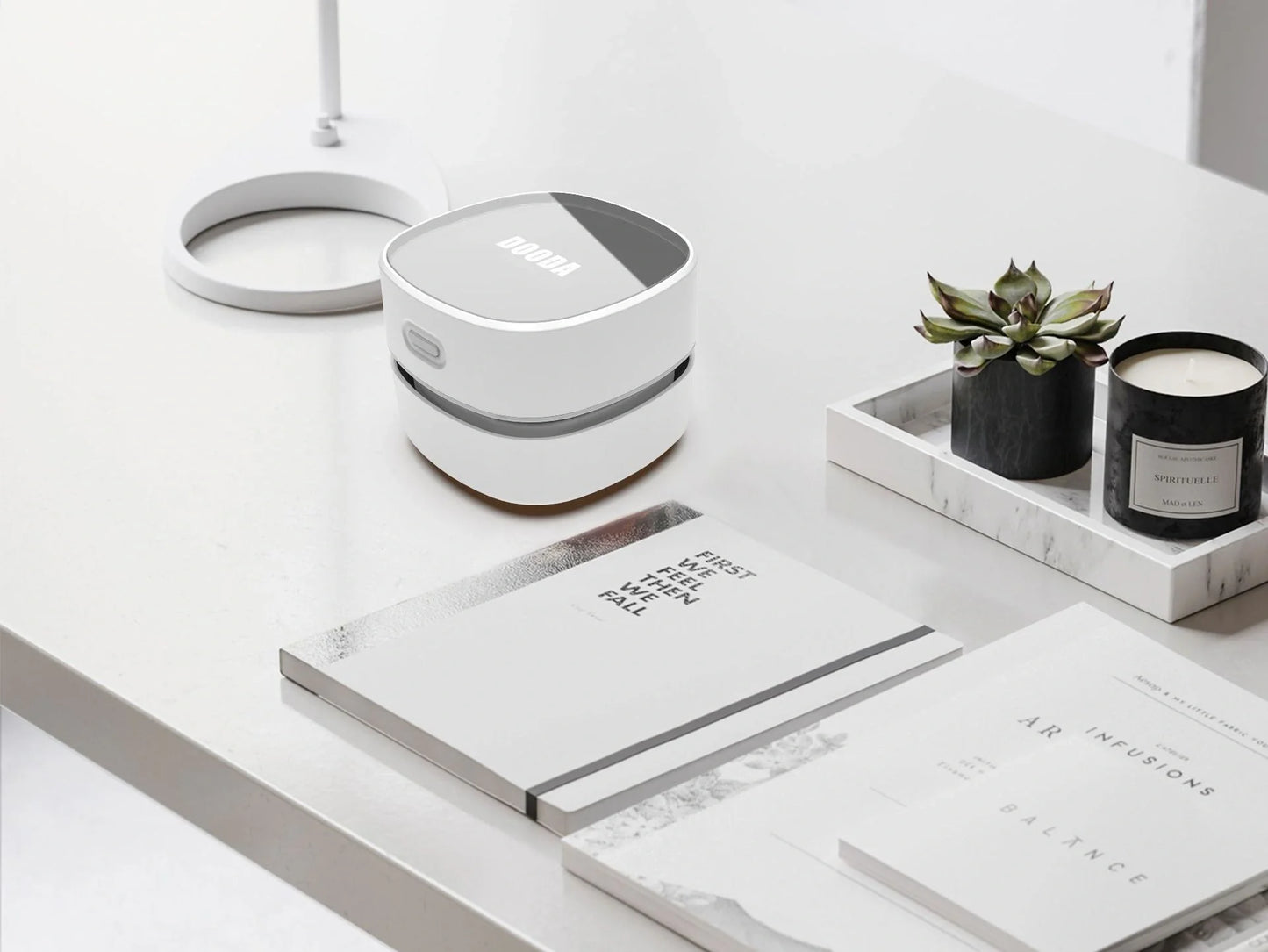 Compact desktop vacuum cleaner with USB charging and strong suction power