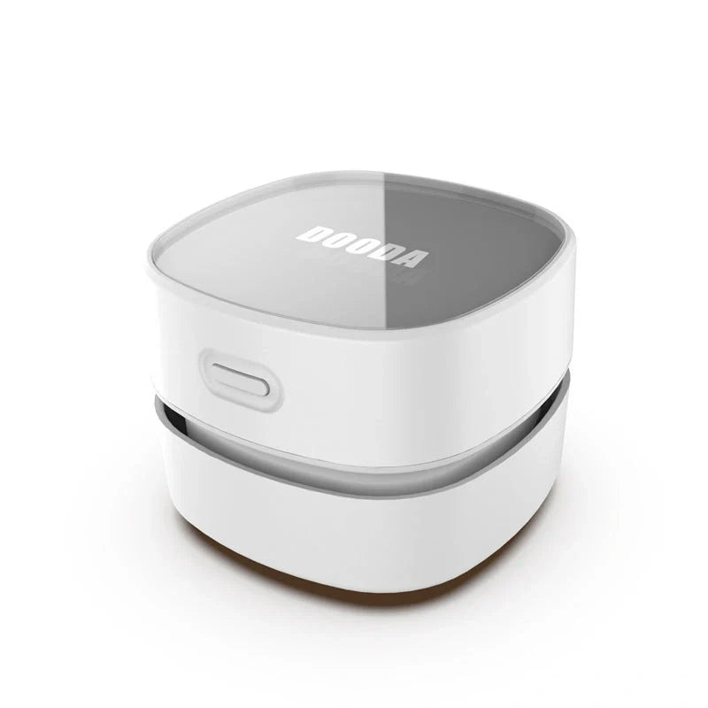 Compact desktop vacuum cleaner with USB charging and strong suction power