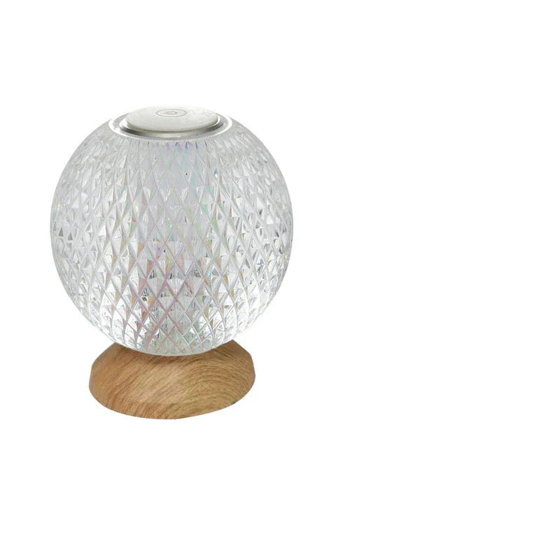 Elegant acrylic crystal bedside lamp with customisable RGB lighting, creating a warm and relaxing atmosphere in the bedroom