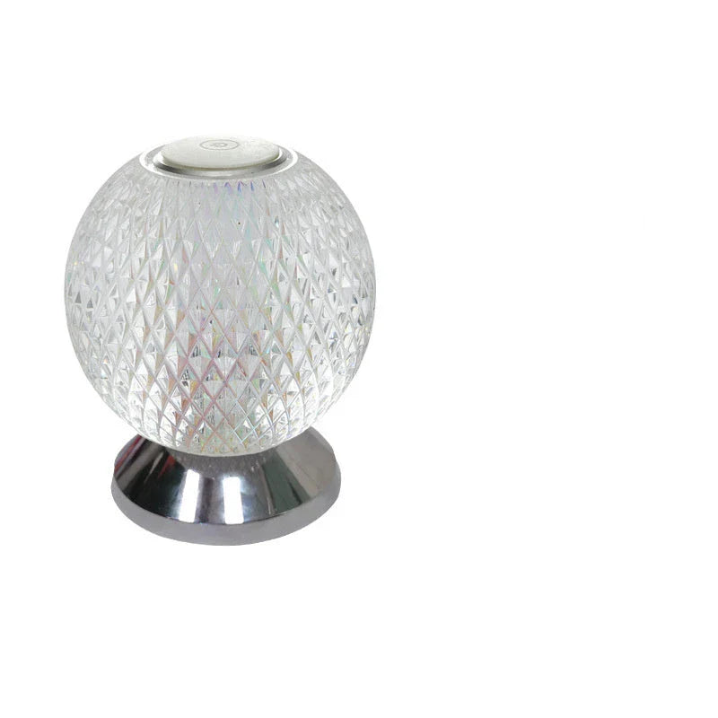 Elegant acrylic crystal bedside lamp with customisable RGB lighting, creating a warm and relaxing atmosphere in the bedroom