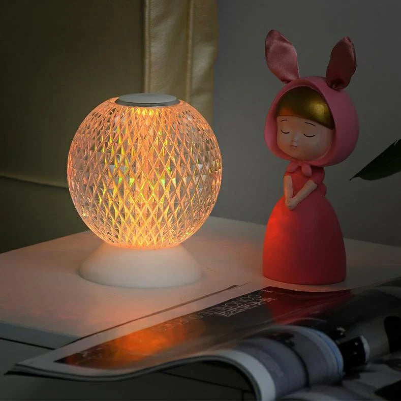 Elegant acrylic crystal bedside lamp with customisable RGB lighting, creating a warm and relaxing atmosphere in the bedroom