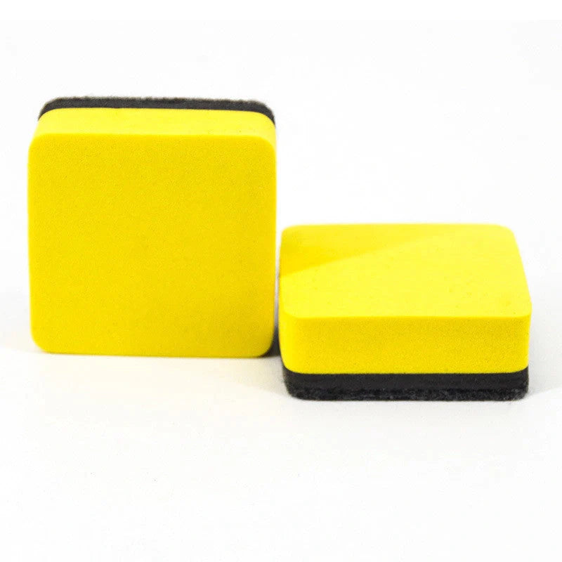 Square blackboard eraser with yellow felt surface for whiteboard markers