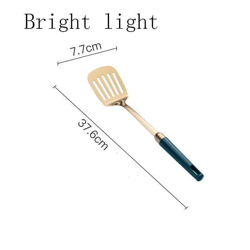 Elegant stainless steel kitchenware set with mirror-polished finish and gold-plated accents, including various utensils like shovels, spoons, ladles, and a serving frame
