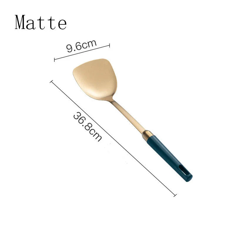 Elegant stainless steel kitchenware set with mirror-polished finish and gold-plated accents, including various utensils like shovels, spoons, ladles, and a serving frame