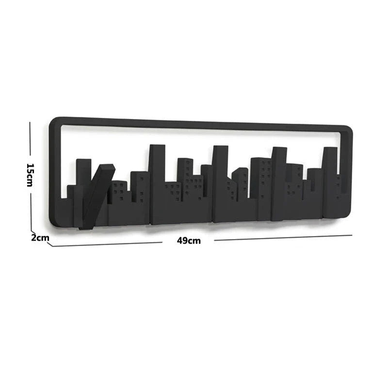 Wall-mounted coat rack with modern, artistic design and 5 flip-down hooks for storing coats, hats, scarves, and more