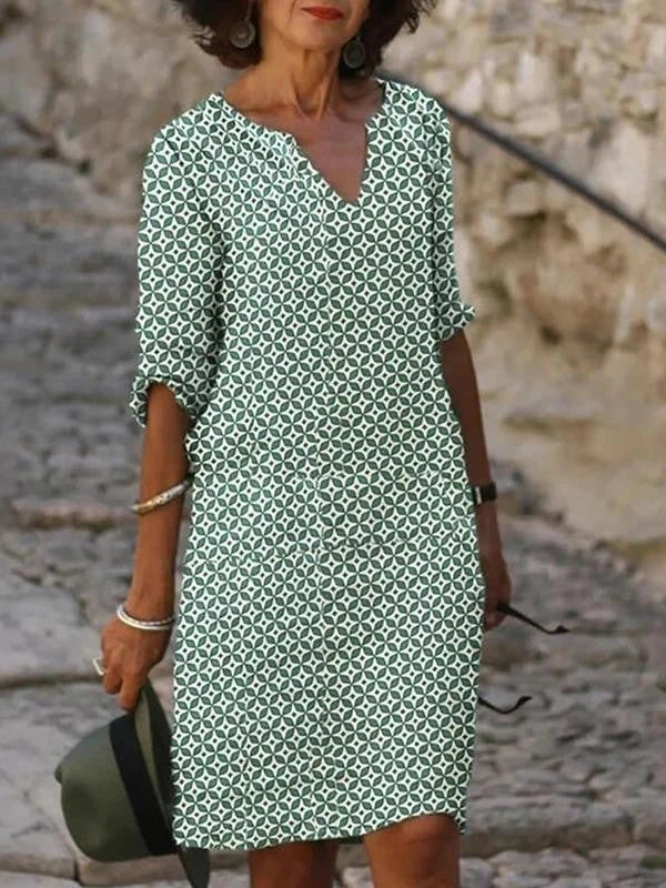 Vibrant mid-length dress with stylish sleeves in a variety of colors including yellow, red, and light green