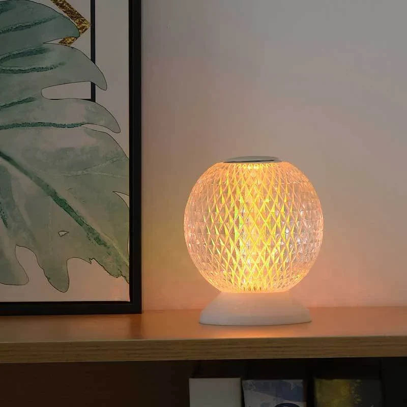 Elegant acrylic crystal bedside lamp with customisable RGB lighting, creating a warm and relaxing atmosphere in the bedroom
