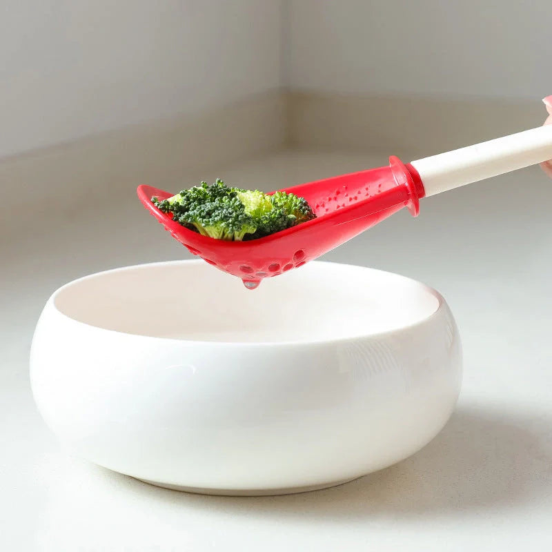 Versatile kitchen spoon for grinding, pressing, and stir-frying in red and black