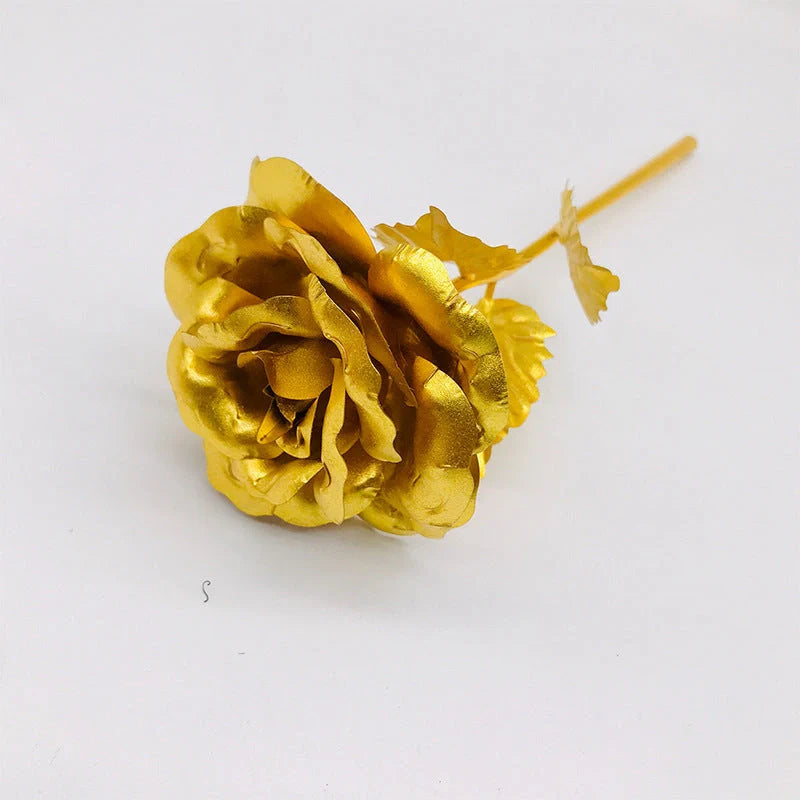 A luxurious 24K gold-plated rose flower bouquet set with a gift box and tote bag