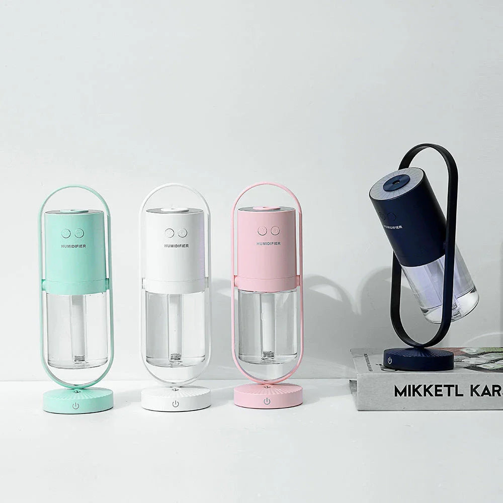 Compact USB Powered Desktop Humidifier with Ambient Lighting, featuring adjustable mist nozzle and romantic starry projection