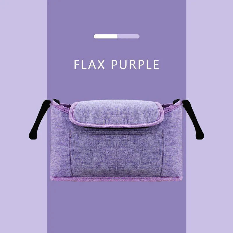 Stylish baby pram organiser bag made of premium cotton and linen materials, featuring various compartments and colour options to keep your child's essentials organised.