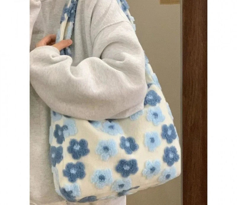 Large capacity fur bag with floral elements and adjustable straps