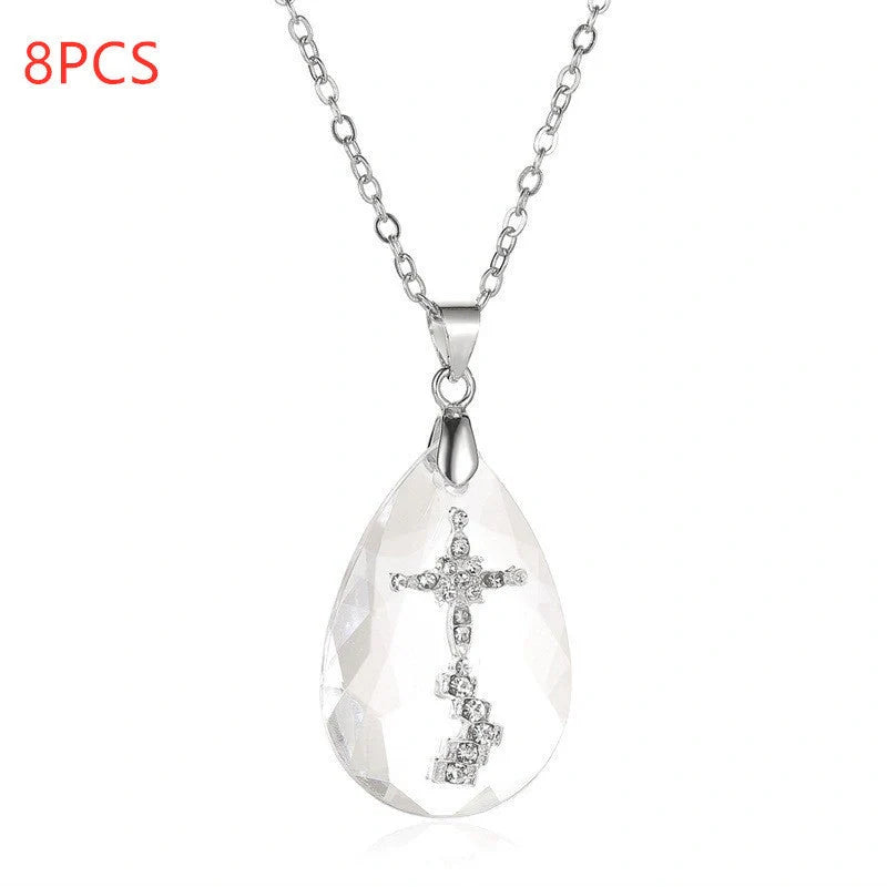 Elegant white drop pendant necklace with cross-chain design, made of premium electroplated alloy for a timeless and sophisticated look.