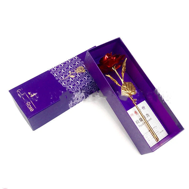 A luxurious 24K gold-plated rose flower bouquet set with a gift box and tote bag